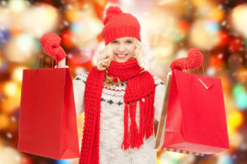 holidays, sale, shopping, christmas concept - beautiful teenage girl in winter clothes with shopping bags