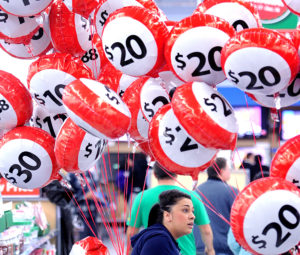 Balloons at an Oakland, Calif., Walmart advertise sale prices to shoppers on Thursday, Nov. 24, 2011. Walmart opened their doors before midnight to encourage early shopping.(AP Photo/Noah Berger)